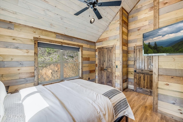 201 Laurel Oaks Way, Gatlinburg, TN 37738 - bedroom featuring wooden walls, lofted ceiling, wood finished floors, and wooden ceiling