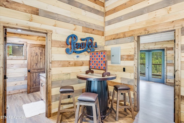201 Laurel Oaks Way, Gatlinburg, TN 37738 - dining room featuring wooden walls, light wood finished floors, and electric panel