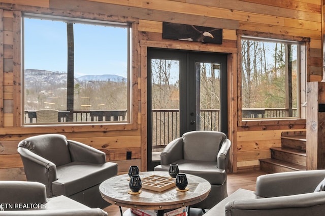 201 Laurel Oaks Way, Gatlinburg, TN 37738 - living area with wood walls, wood finished floors, a mountain view, and french doors