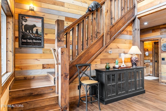 201 Laurel Oaks Way, Gatlinburg, TN 37738 - staircase with wooden walls and wood finished floors