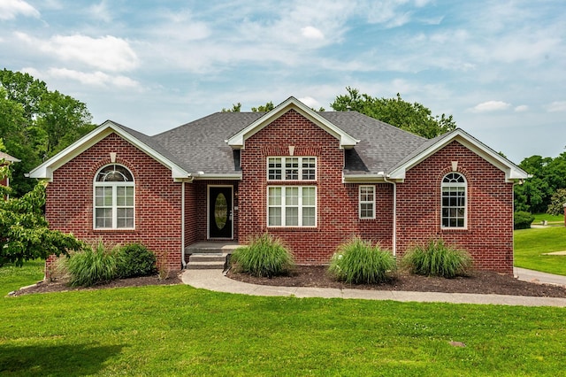 102 Buckhaven Ct, Hendersonville, TN 37075 - view of front of property featuring brick siding, a front yard, and roof with shingles