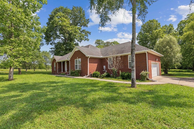 209 Taylor Creek Ln, Chapel Hill, TN 37034 - ranch-style house with brick siding, a garage, concrete driveway, and a front lawn