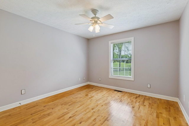 209 Taylor Creek Ln, Chapel Hill, TN 37034 - spare room with light wood-type flooring, ceiling fan, and a textured ceiling