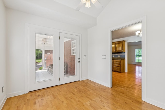 209 Taylor Creek Ln, Chapel Hill, TN 37034 - unfurnished room with a ceiling fan, light wood-type flooring, vaulted ceiling, and a chandelier