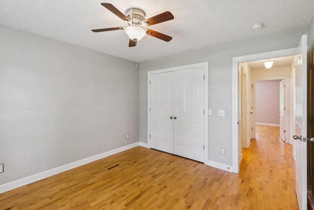 209 Taylor Creek Ln, Chapel Hill, TN 37034 - unfurnished bedroom featuring light wood-type flooring, a closet, and a ceiling fan