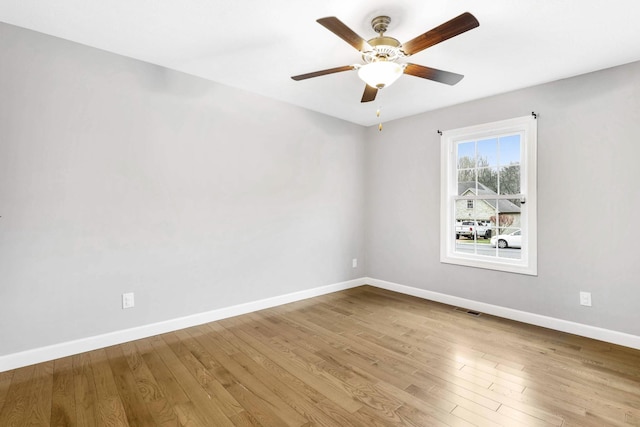 458 Robins Trl, Westmoreland, TN 37186 - empty room featuring a ceiling fan and wood finished floors