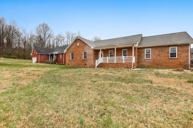 458 Robins Trl, Westmoreland, TN 37186 - single story home with a porch, brick siding, a front lawn, and a shingled roof