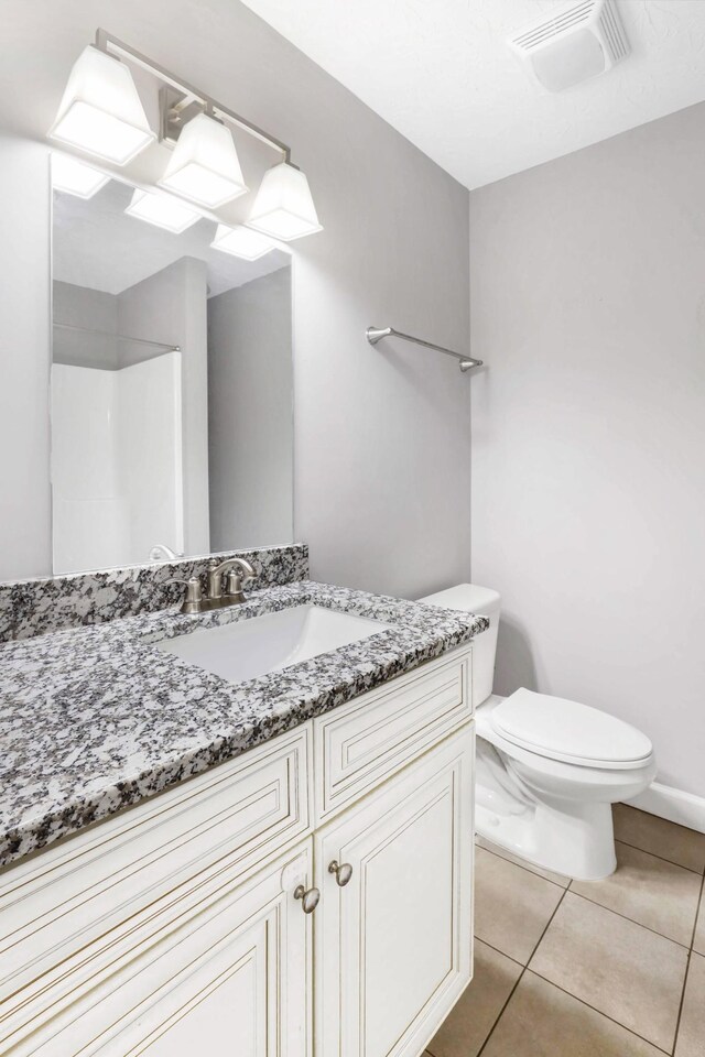 458 Robins Trl, Westmoreland, TN 37186 - bathroom featuring vanity, tile patterned flooring, and a shower