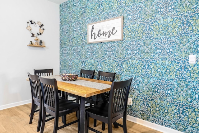 7178 Lang Ave, White House, TN 37188 - dining area with wallpapered walls and wood finished floors