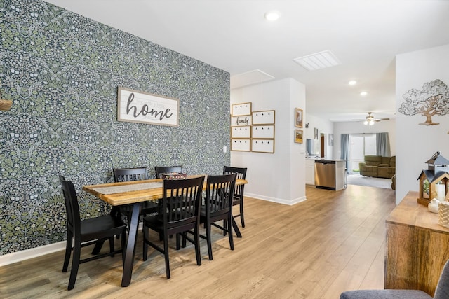 7178 Lang Ave, White House, TN 37188 - dining area featuring wallpapered walls, an accent wall, recessed lighting, light wood-style flooring, and a ceiling fan