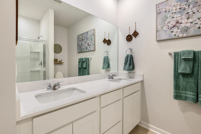 7178 Lang Ave, White House, TN 37188 - bathroom with double vanity and a shower with shower door