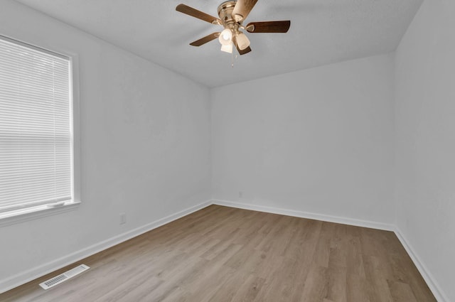 308 Custer Ct, Smyrna, TN 37167 - spare room featuring wood finished floors, a ceiling fan, and healthy amount of natural light