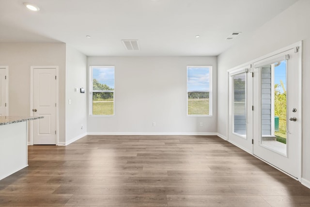 130 Grayson Cir, Chapel Hill, TN 37034 - unfurnished living room with wood finished floors, plenty of natural light, and recessed lighting