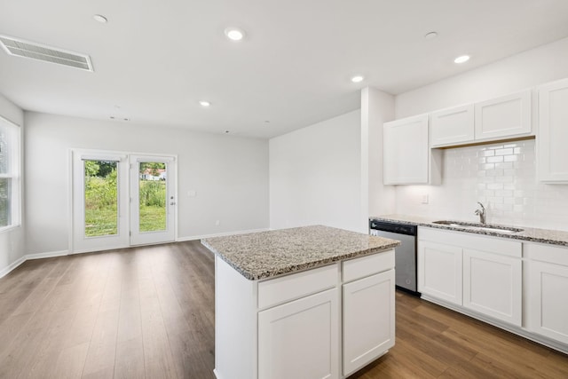 130 Grayson Cir, Chapel Hill, TN 37034 - kitchen featuring dishwasher, plenty of natural light, decorative backsplash, light stone countertops, and recessed lighting
