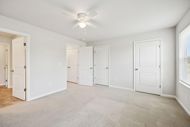 130 Grayson Cir, Chapel Hill, TN 37034 - unfurnished bedroom featuring carpet, two closets, and ceiling fan