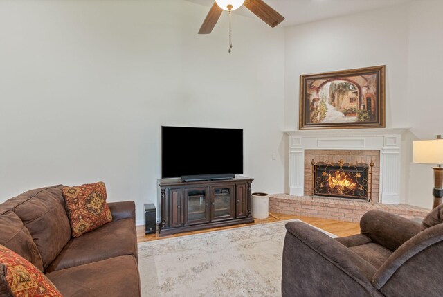 123 River Downs Blvd, Murfreesboro, TN 37128 - living area with a ceiling fan, a fireplace, and wood finished floors