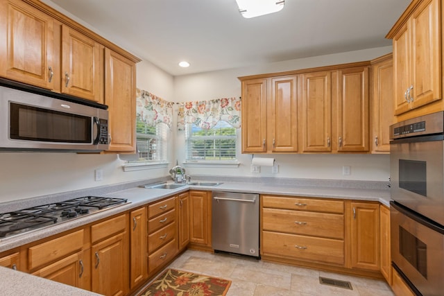 123 River Downs Blvd, Murfreesboro, TN 37128 - kitchen featuring stainless steel appliances, light countertops, and recessed lighting
