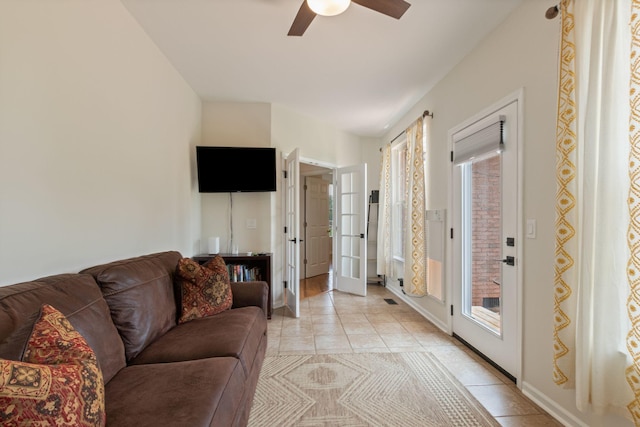 123 River Downs Blvd, Murfreesboro, TN 37128 - living area featuring light tile patterned flooring, a ceiling fan, and french doors