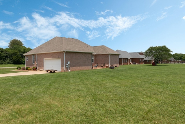123 River Downs Blvd, Murfreesboro, TN 37128 - view of home's exterior with a yard, driveway, an attached garage, and brick siding