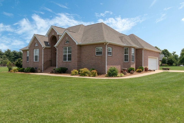 123 River Downs Blvd, Murfreesboro, TN 37128 - view of front of property with brick siding, a garage, a front yard, driveway, and roof with shingles