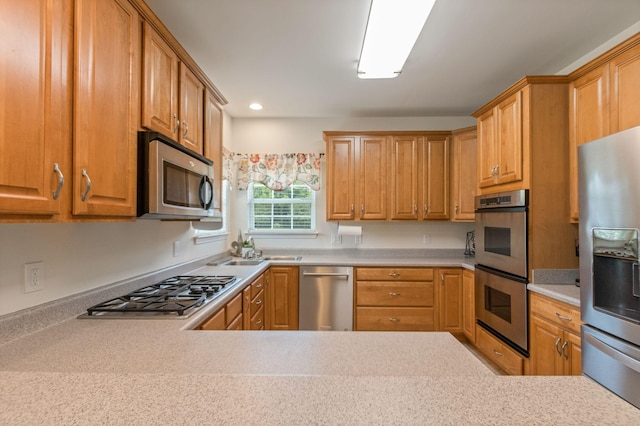 123 River Downs Blvd, Murfreesboro, TN 37128 - kitchen featuring stainless steel appliances, light countertops, and recessed lighting