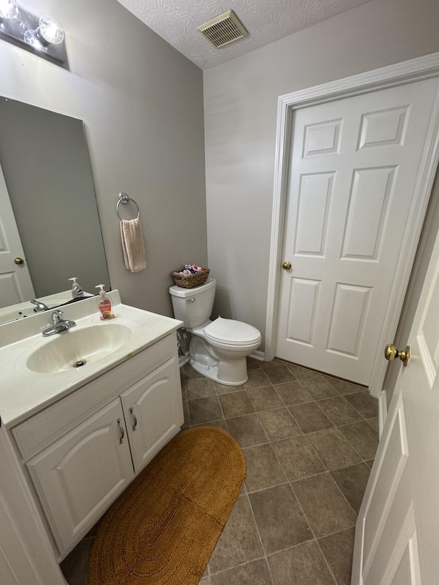 1114 Lea Cir, Lebanon, TN 37087 - bathroom featuring vanity, tile patterned flooring, and a textured ceiling