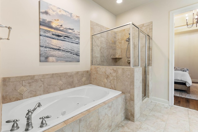 104 Majestic Ln, Franklin, TN 37064 - ensuite bathroom featuring a jetted tub and a shower stall