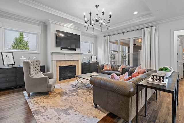 104 Majestic Ln, Franklin, TN 37064 - living room featuring healthy amount of natural light, wood finished floors, a chandelier, ornamental molding, and recessed lighting