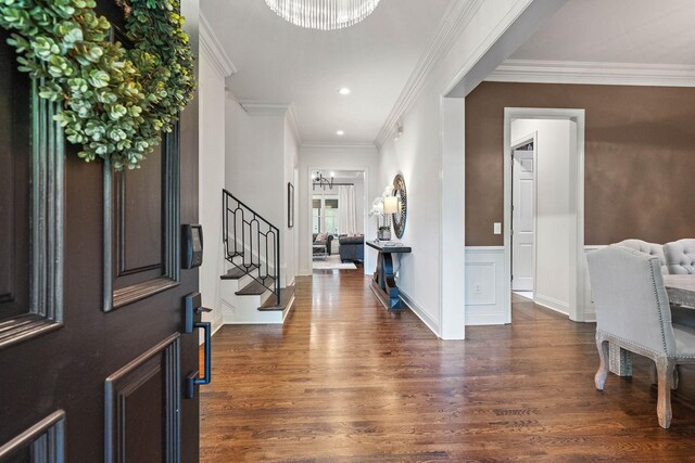 104 Majestic Ln, Franklin, TN 37064 - entrance foyer featuring wood finished floors, stairs, wainscoting, ornamental molding, and a chandelier