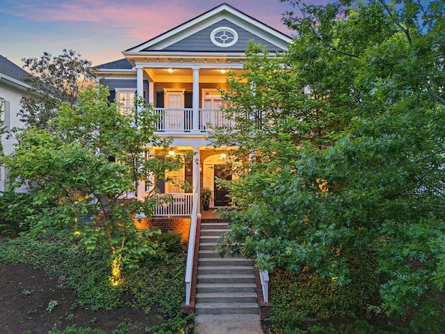 104 Majestic Ln, Franklin, TN 37064 - view of front of property featuring a balcony, stairway, and a porch