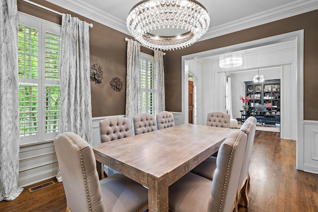 104 Majestic Ln, Franklin, TN 37064 - dining space with a chandelier, ornamental molding, wood finished floors, a wainscoted wall, and a decorative wall