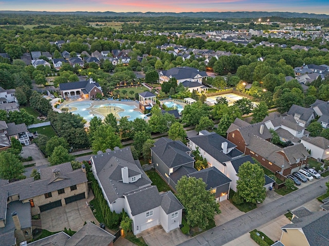 104 Majestic Ln, Franklin, TN 37064 - aerial view at dusk of view of pool and a residential view