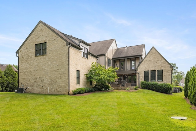 4310 Kings Camp Ct, Arrington, TN 37014 - back of property with a yard, brick siding, roof with shingles, and a balcony