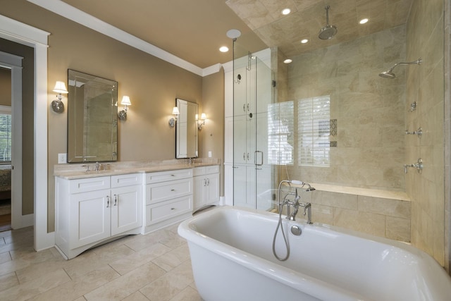 4310 Kings Camp Ct, Arrington, TN 37014 - full bath featuring a stall shower, a freestanding bath, double vanity, ornamental molding, and recessed lighting