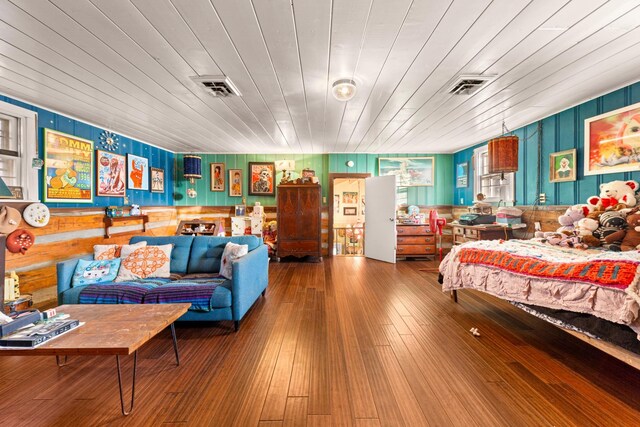 7139 Kingston Rd, Fairview, TN 37062 - bedroom featuring wooden walls and hardwood / wood-style flooring