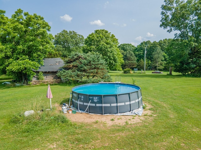 7139 Kingston Rd, Fairview, TN 37062 - swimming pool featuring a lawn