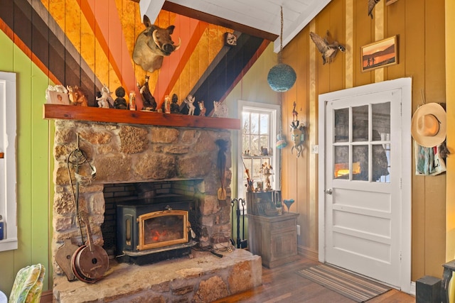 7139 Kingston Rd, Fairview, TN 37062 - living room featuring wood finished floors, a wood stove, and wood walls