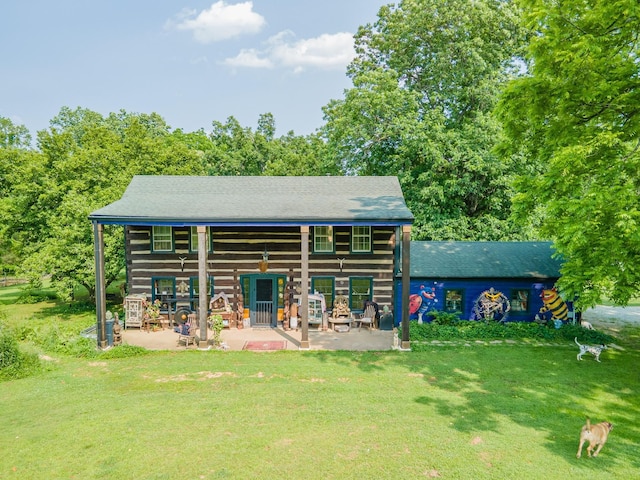7139 Kingston Rd, Fairview, TN 37062 - back of property featuring a lawn and a patio area