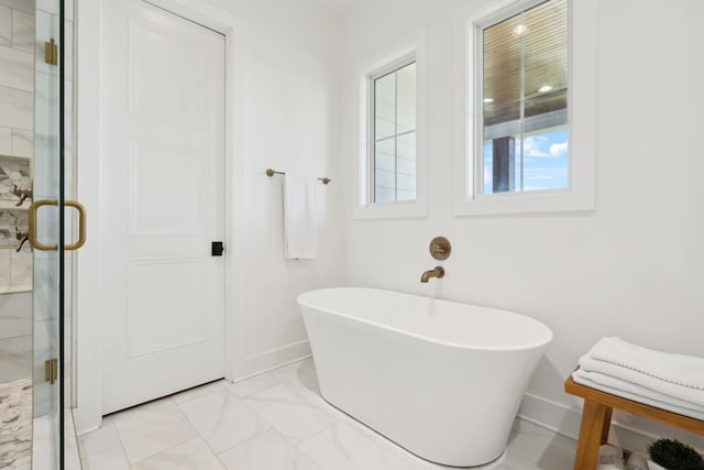 973 Hall Cemetery Rd, Burns, TN 37029 - bathroom featuring a freestanding tub, marble finish flooring, and a shower stall