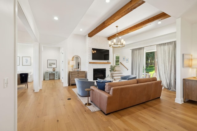 973 Hall Cemetery Rd, Burns, TN 37029 - living area with light wood finished floors, a large fireplace, beam ceiling, recessed lighting, and a chandelier