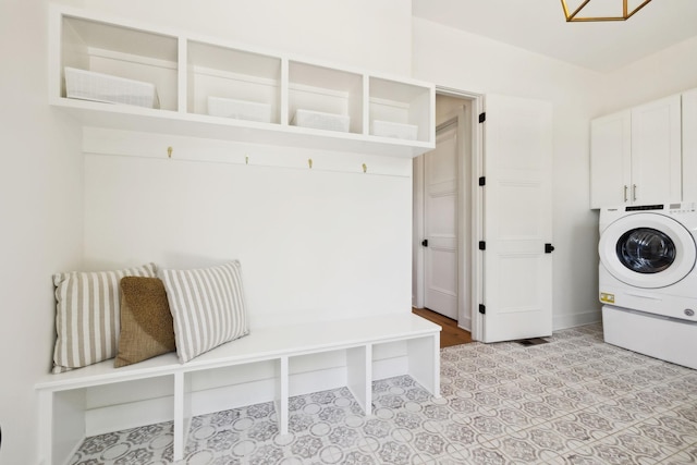 973 Hall Cemetery Rd, Burns, TN 37029 - laundry area with cabinet space and washer / dryer