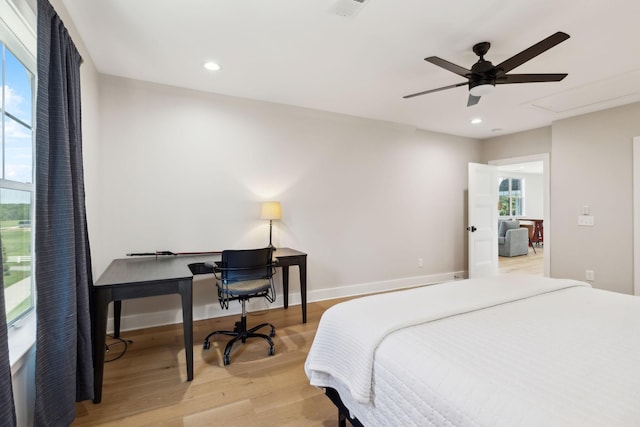 973 Hall Cemetery Rd, Burns, TN 37029 - bedroom with light wood finished floors, recessed lighting, an office area, and a ceiling fan