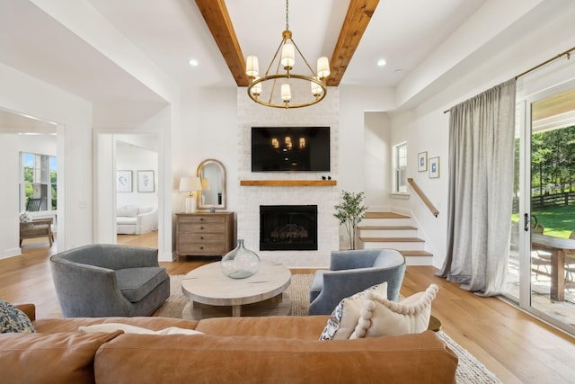 973 Hall Cemetery Rd, Burns, TN 37029 - living room with plenty of natural light, wood finished floors, a chandelier, beamed ceiling, and recessed lighting