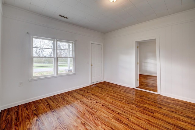 713 SE Atlantic St, Tullahoma, TN 37388 - spare room with wood finished floors and ornamental molding