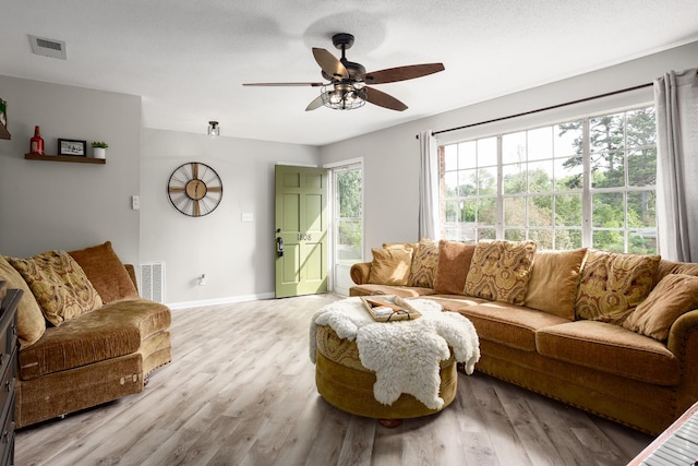 1808 Nassau Blvd, Florence, AL 35630 - living area with ceiling fan and light wood finished floors