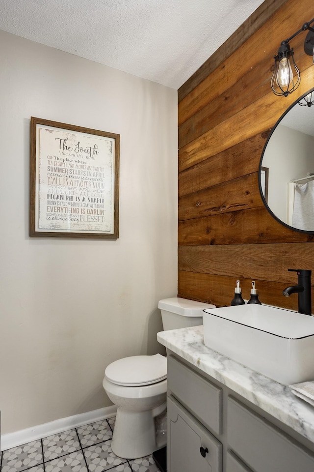 1808 Nassau Blvd, Florence, AL 35630 - bathroom with vanity and a textured ceiling