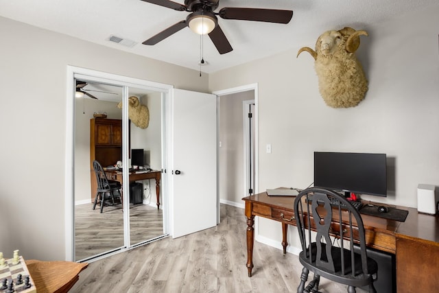 1808 Nassau Blvd, Florence, AL 35630 - office area with a ceiling fan and light wood-style floors