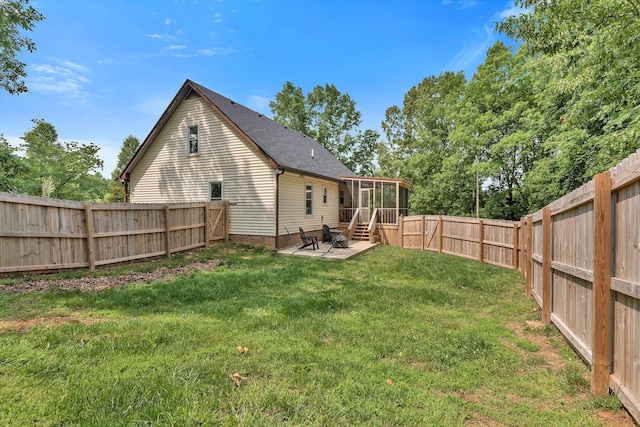 141 Springbrook Pl, Joelton, TN 37080 - back of property featuring a sunroom, a patio area, a fenced backyard, and roof with shingles