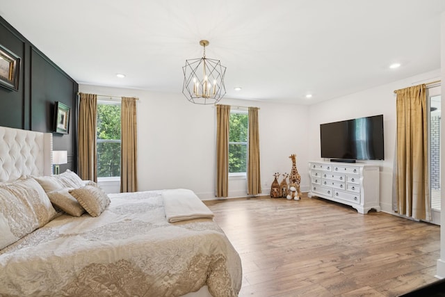 5128 Terravista Ln, Franklin, TN 37064 - bedroom featuring a chandelier, wood finished floors, and recessed lighting