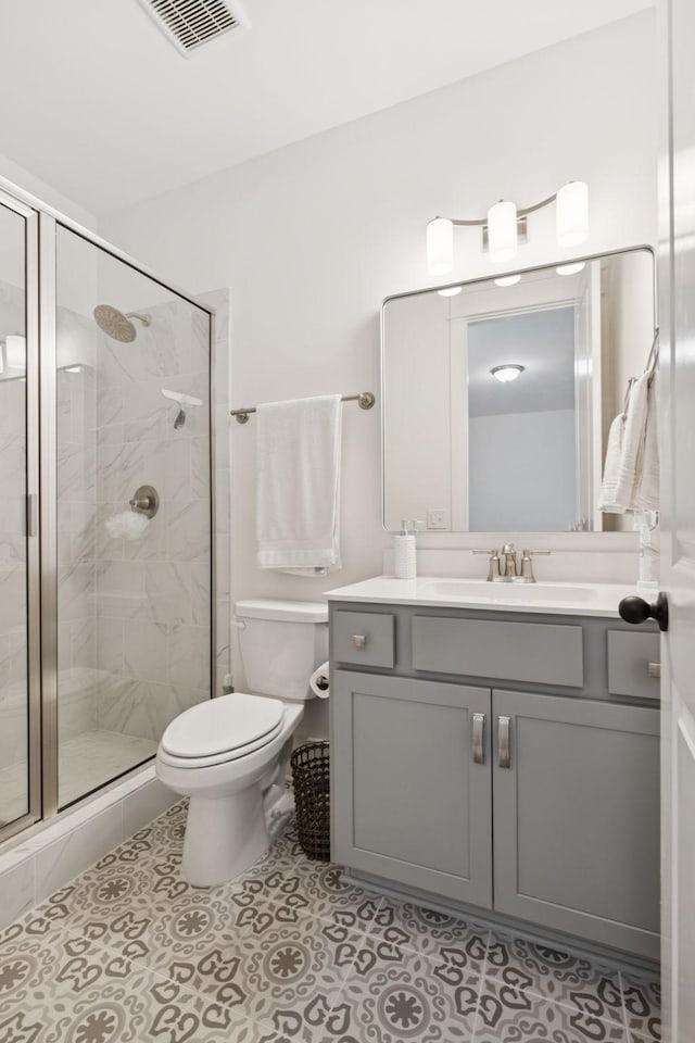 5128 Terravista Ln, Franklin, TN 37064 - bathroom featuring a stall shower, vanity, and tile patterned flooring